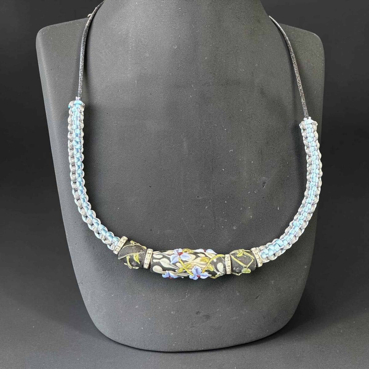 Silver Lining | Three-Bead Lampwork Glass Flower Necklace on Ice Blue & Grey Braided Cord
