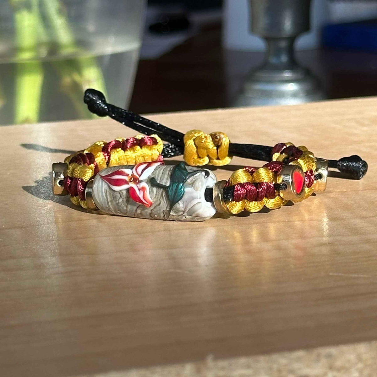 Saffron Garnet | Lampwork Glass Flower Bracelet on Mustard Gold & Burgundy Braided Cord