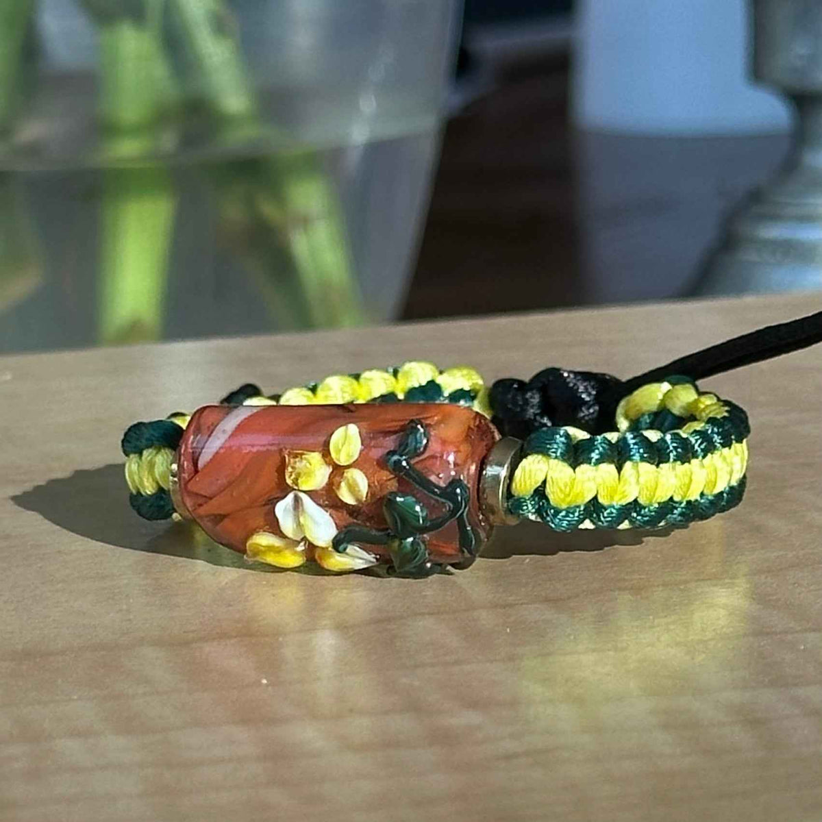 Primrose Clay | Lampwork Glass Flower Bracelet on Yellow & Forest Green Braided Cord