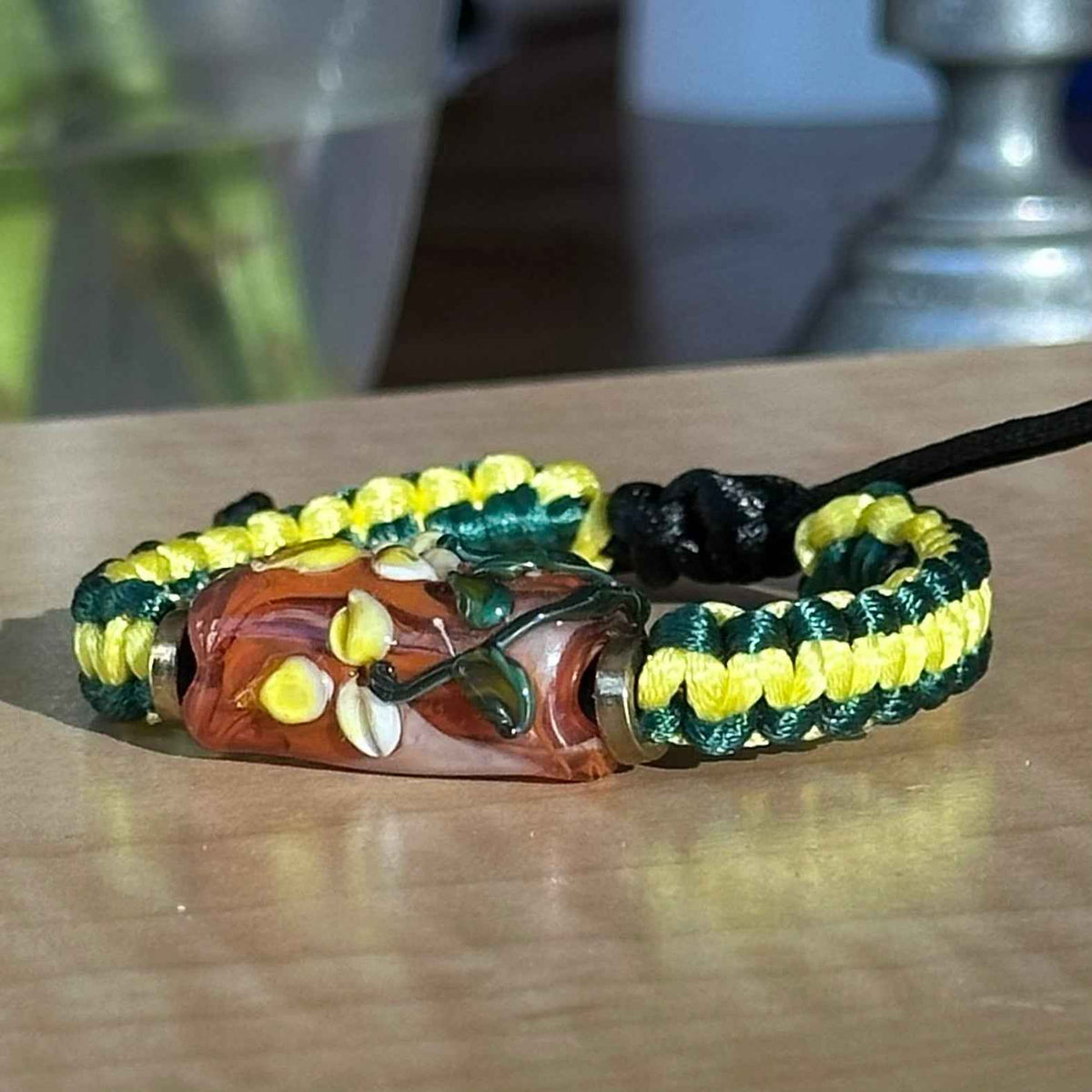 Primrose Clay | Lampwork Glass Flower Bracelet on Yellow & Forest Green Braided Cord
