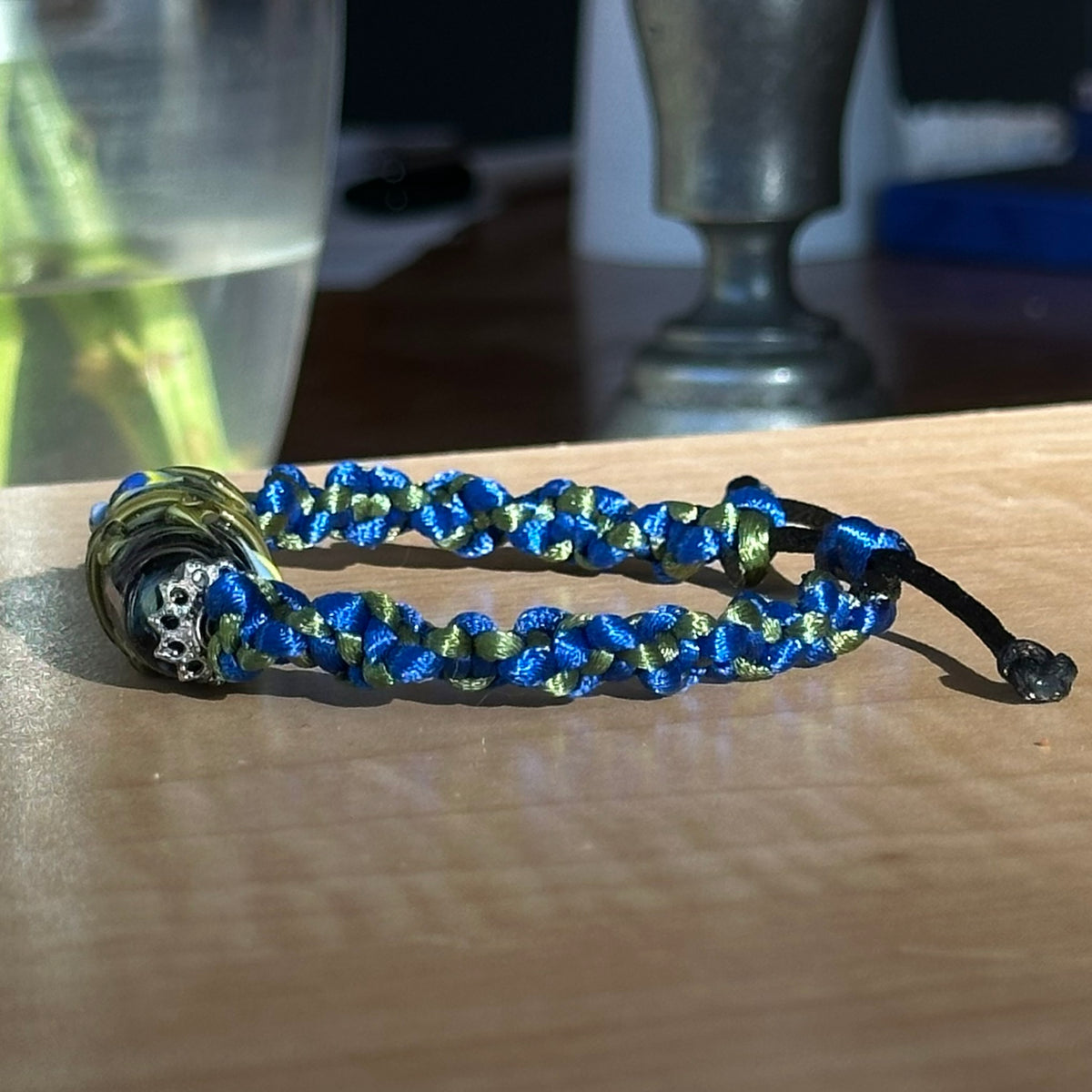Larkspur Dusk | Lampwork Glass Flower Bracelet on Royal Blue & Olive Braided Cord
