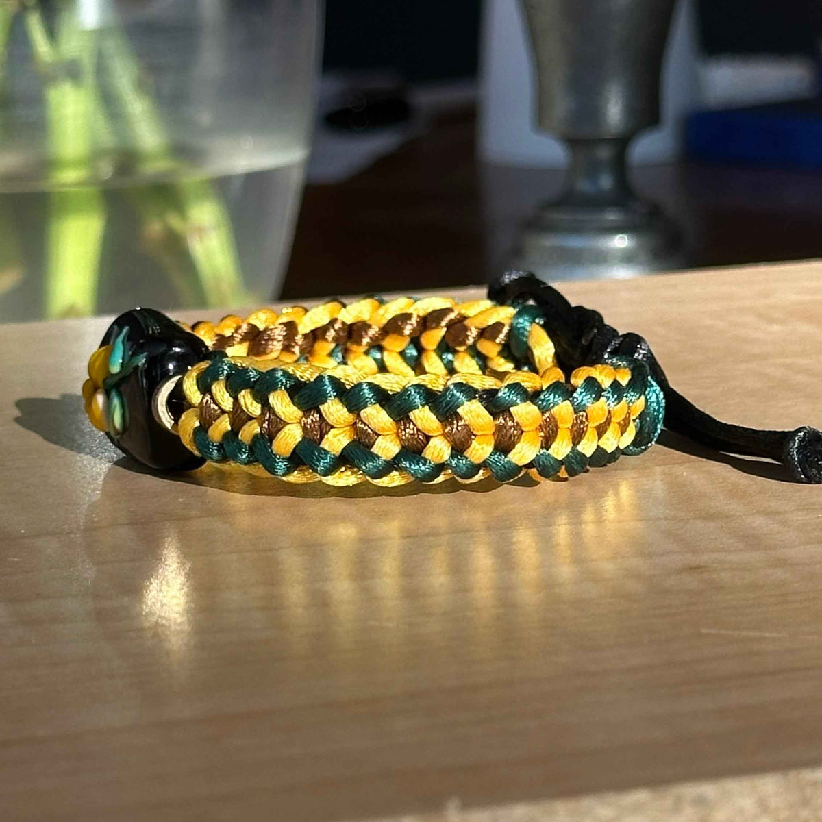 Black-Eyed Susan | Lampwork Glass Flower Bracelet on Golden Yellow, Green & Brown Braided Cord
