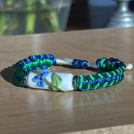 Bluebonnet Glade | Lampwork Glass Flower Bracelet on Emerald Green & Royal Blue Braided Cord