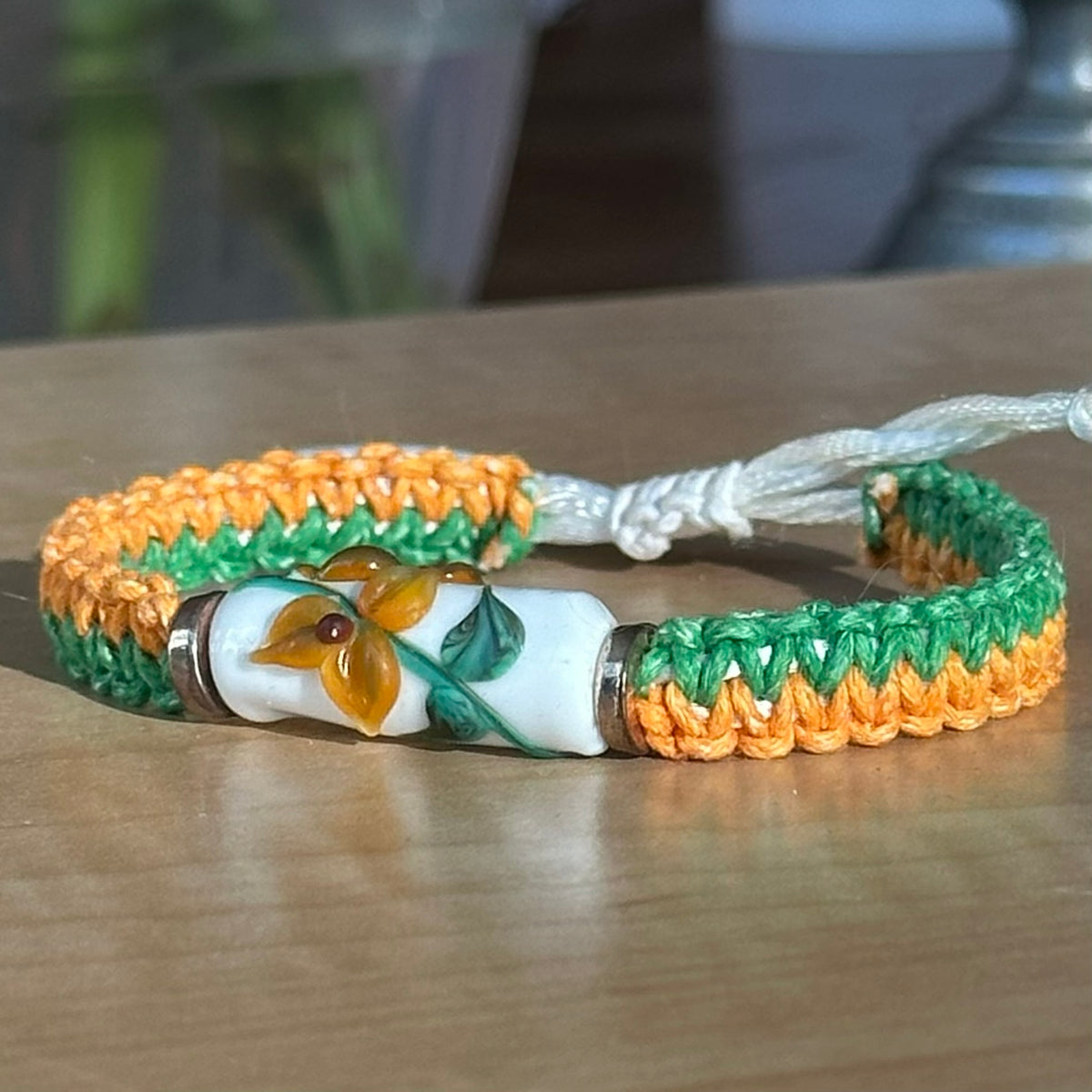 Marigold Meadow | Lampwork Glass Flower Bracelet on Orange & Green Woven Cotton Cord