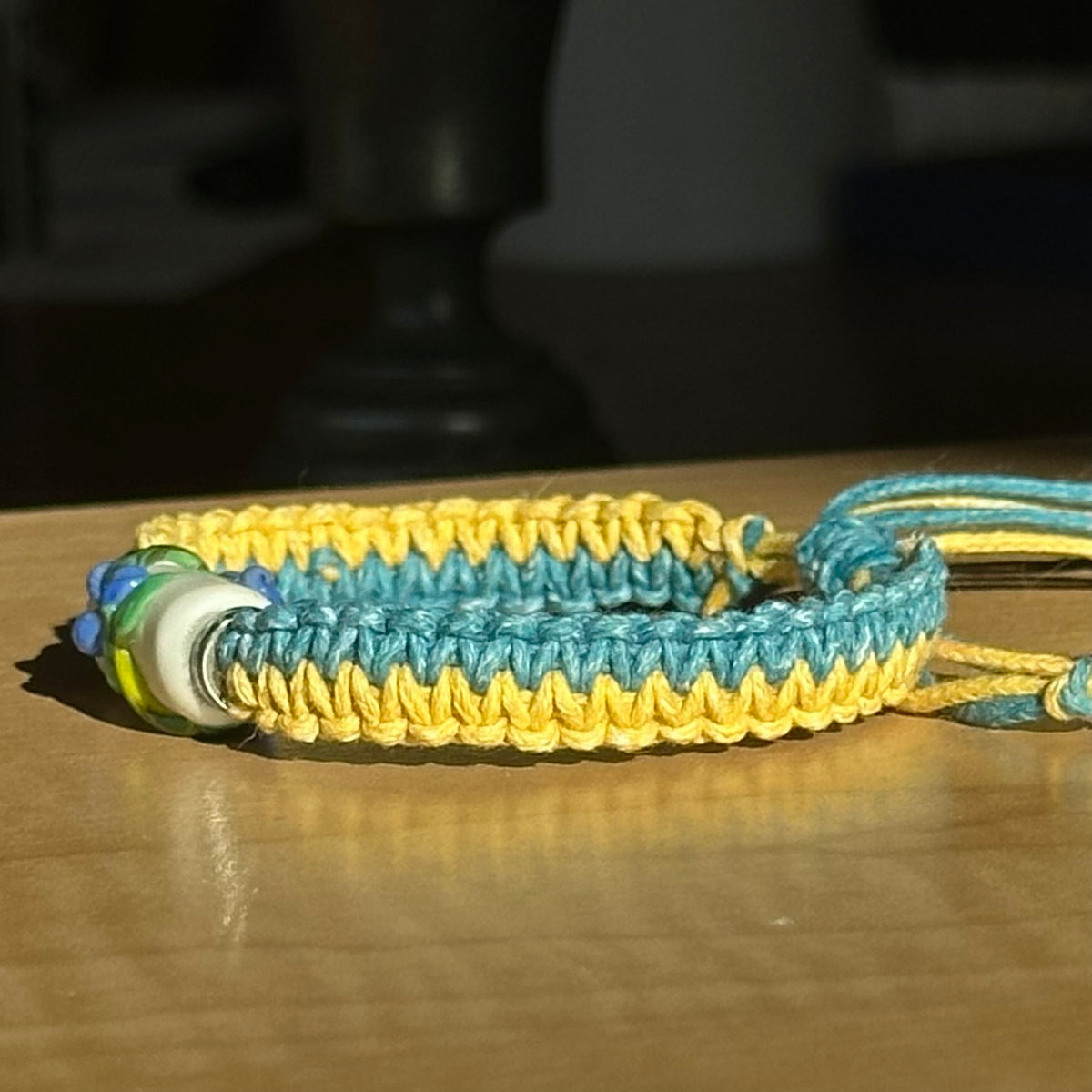 Lagoon Delphinium | Lampwork Glass Flower Bracelet on Teal & Yellow Woven Cotton Cord