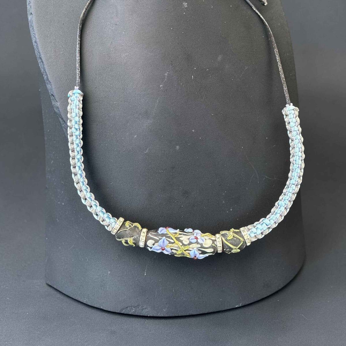 Silver Lining | Three-Bead Lampwork Glass Flower Necklace on Ice Blue & Grey Braided Cord