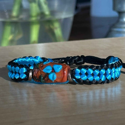 Cerulean Ember | Lampwork Glass Flower Bracelet on Blue & Black Braided Cord