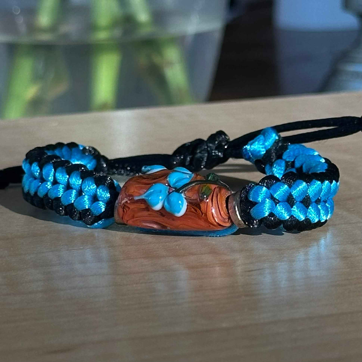 Cerulean Ember | Lampwork Glass Flower Bracelet on Blue & Black Braided Cord