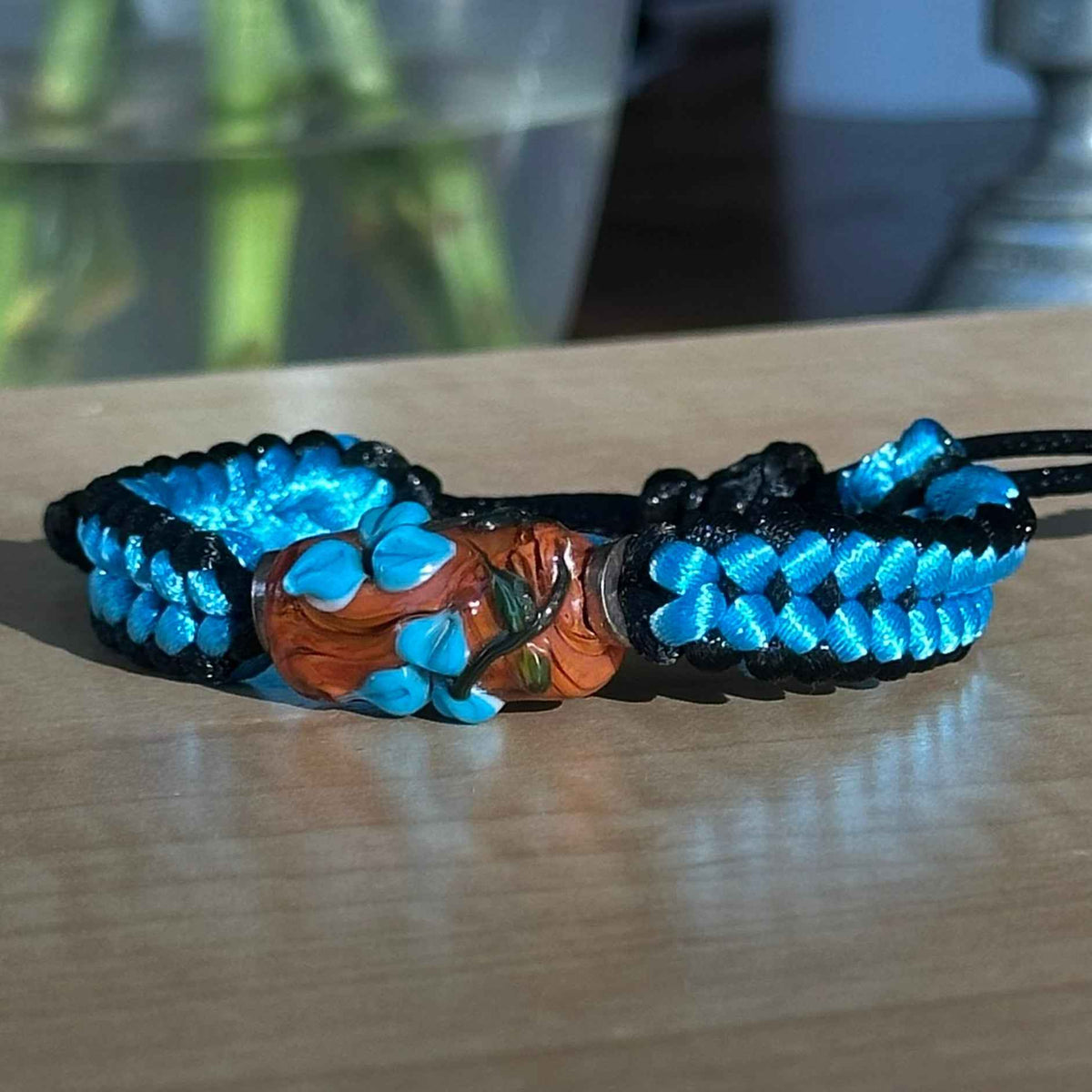 Cerulean Ember | Lampwork Glass Flower Bracelet on Blue & Black Braided Cord