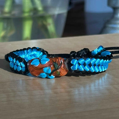 Cerulean Ember | Lampwork Glass Flower Bracelet on Blue & Black Braided Cord