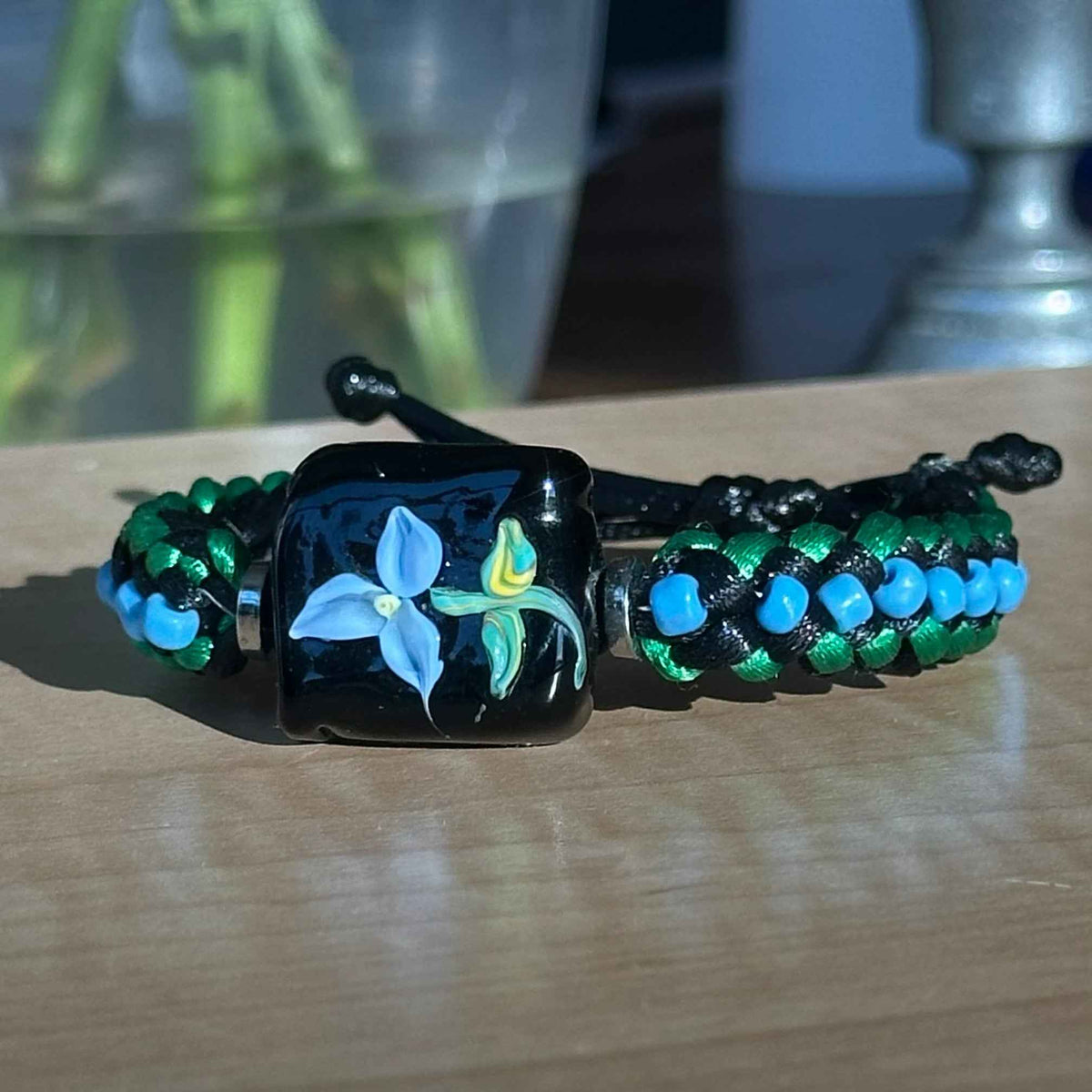 Wildwood Blue | Lampwork Glass Flower Bracelet on Emerald Green & Black Braided Cord