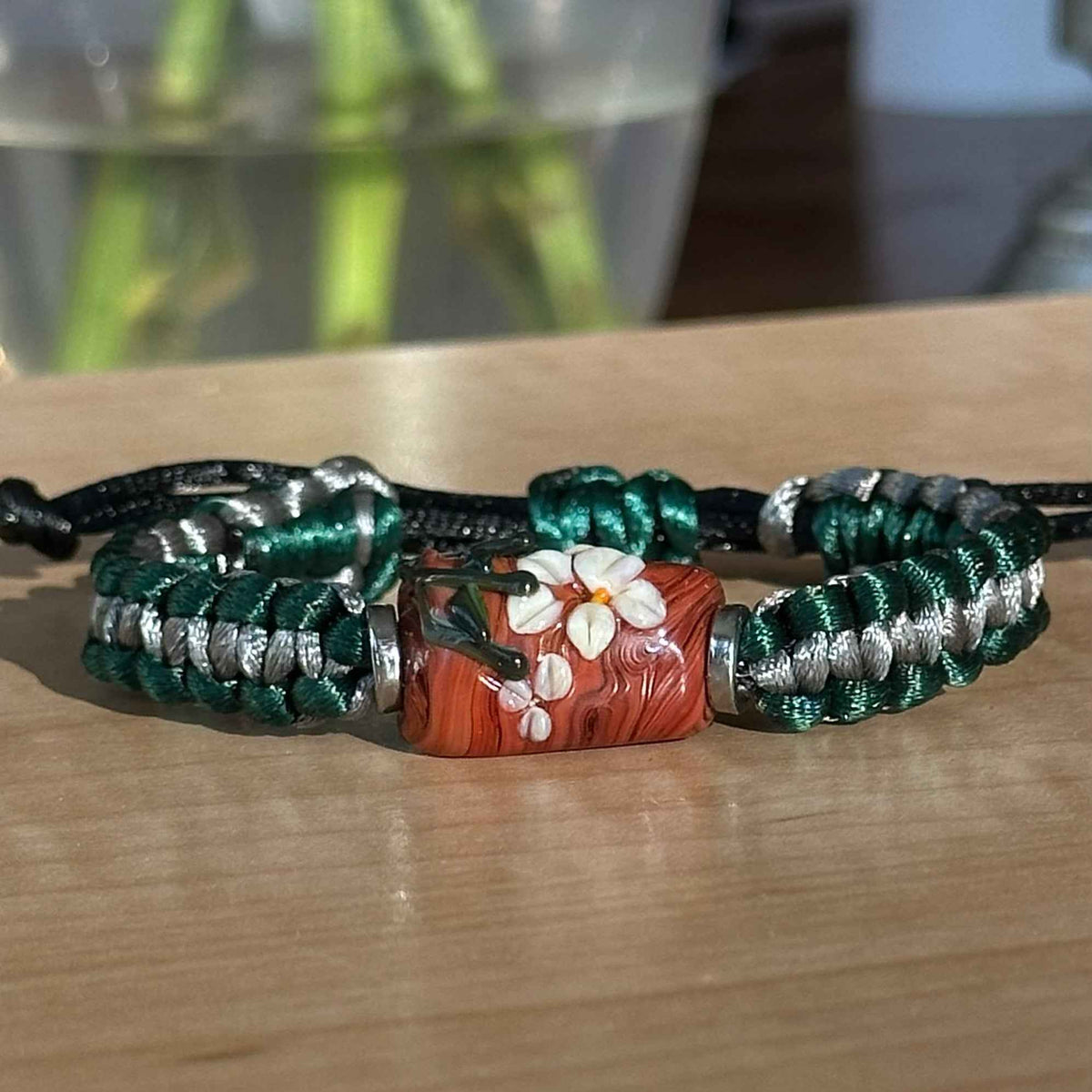 Evergreen Ash | Lampwork Glass Flower Bracelet on Forest Green & Gray Braided Cord