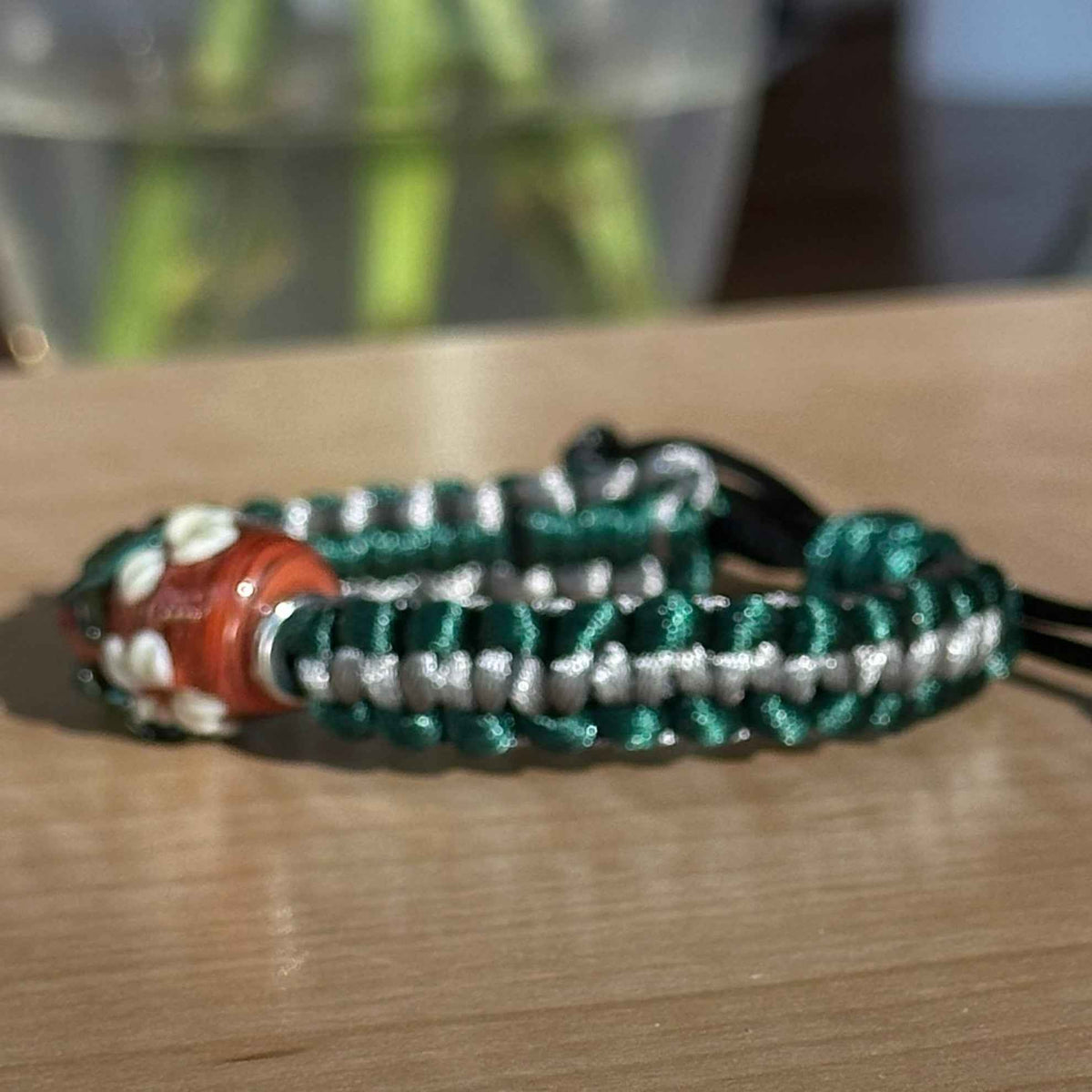 Evergreen Ash | Lampwork Glass Flower Bracelet on Forest Green & Gray Braided Cord