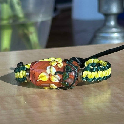 Primrose Clay | Lampwork Glass Flower Bracelet on Yellow & Forest Green Braided Cord