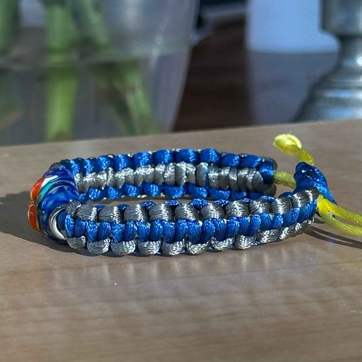 Sapphire Tangerine | Lampwork Glass Flower Bracelet on Royal Blue & Gray Braided Cord