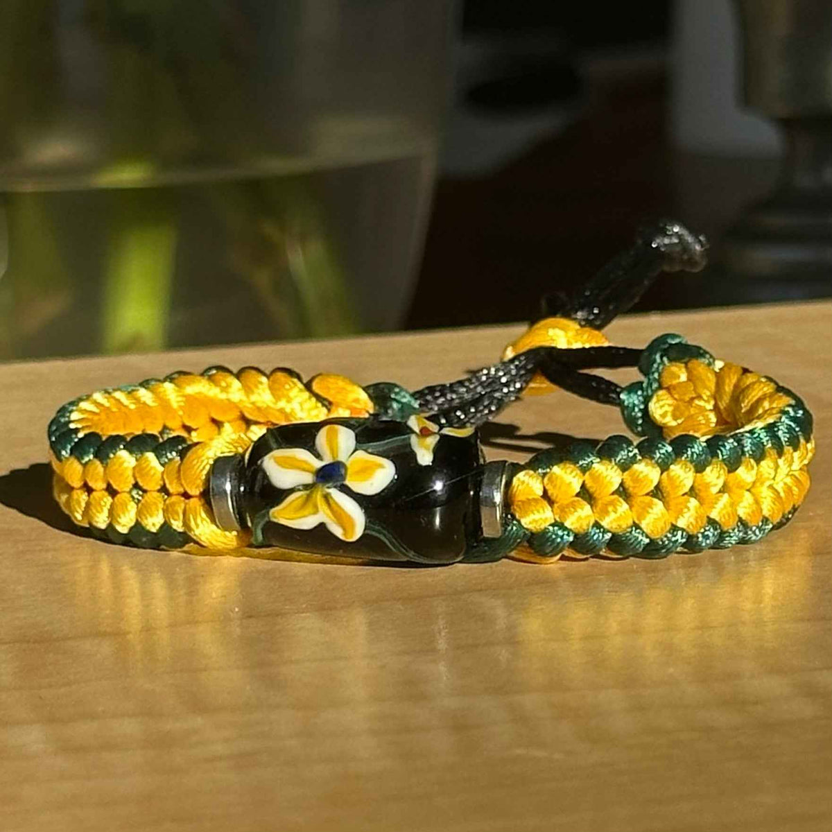 Gilded Jasmine | Lampwork Glass Flower Bracelet on Gold & Forest Green Braided Cord
