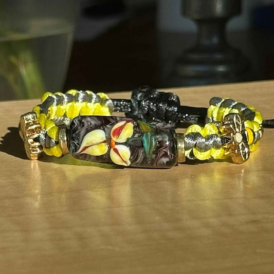 Buttercup Slate | Lampwork Glass Flower Bracelet with Flower Charms on Lime Yellow & Gray Braided Cord