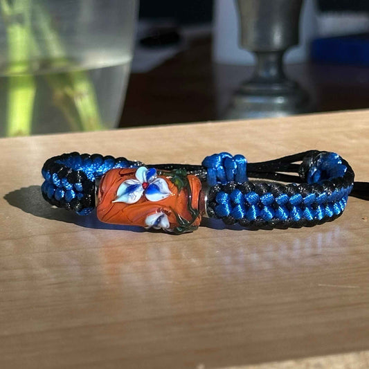 Bluebell Rust | Lampwork Glass Flower Bracelet on Royal Blue & Black Braided Cord
