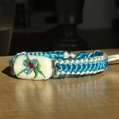 Glacier Orchid | Lampwork Glass Flower Bracelet on Sky Blue & White Braided Cord