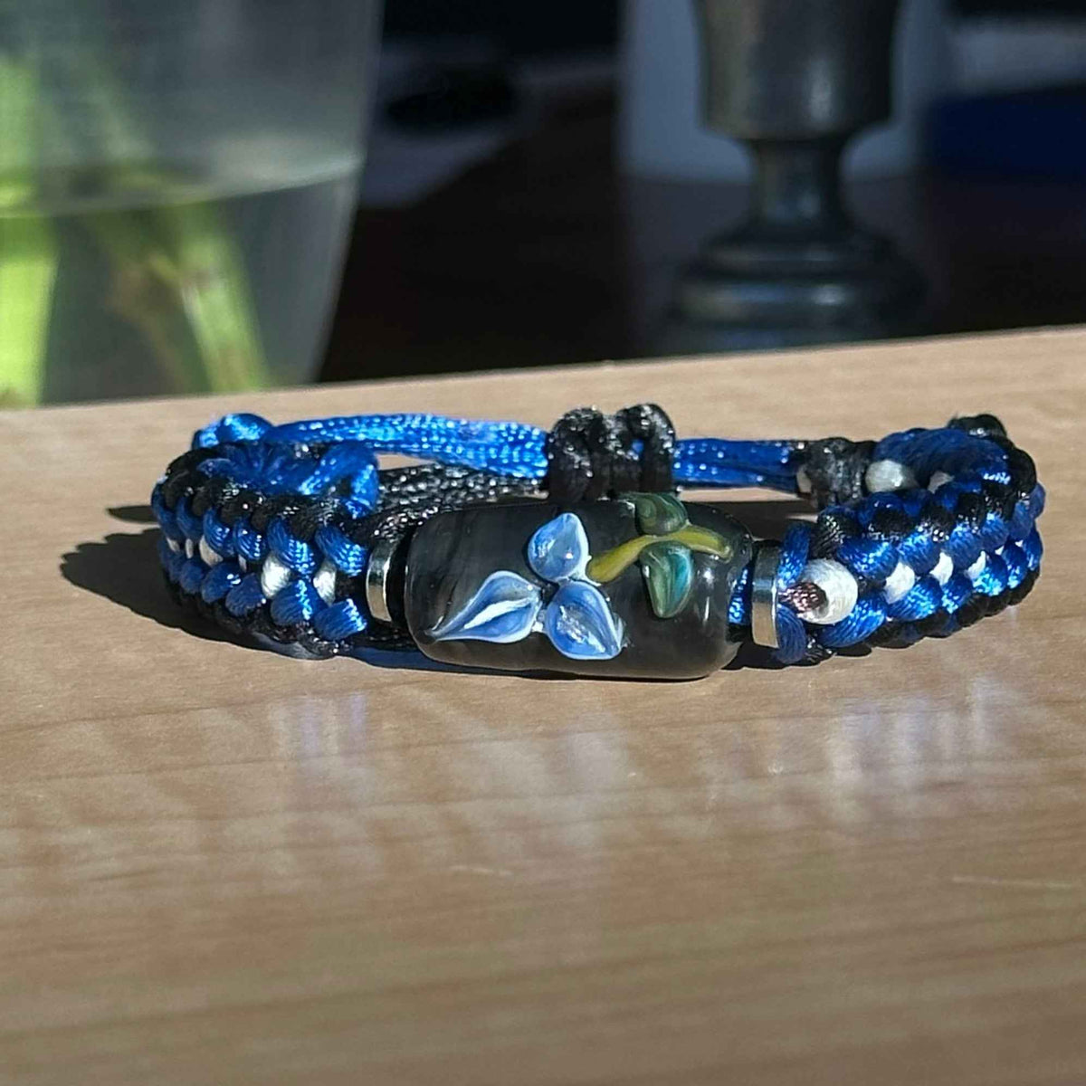 Periwinkle Storm | Lampwork Glass Flower Bracelet on Royal Blue, Black & White Braided Cord