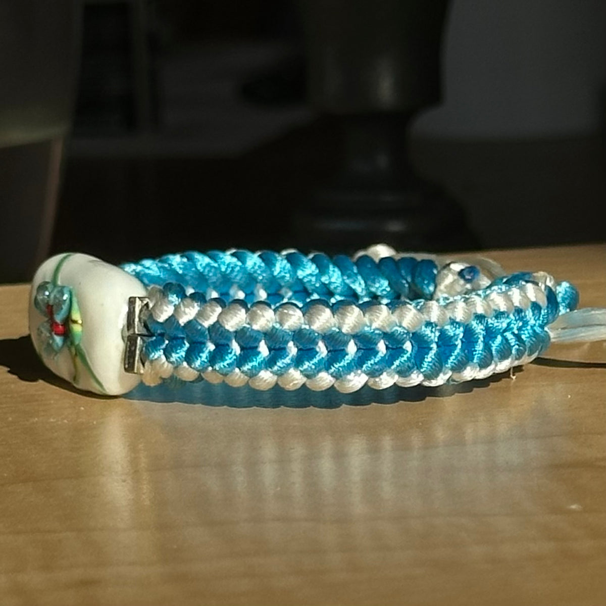 Glacier Orchid | Lampwork Glass Flower Bracelet on Sky Blue & White Braided Cord