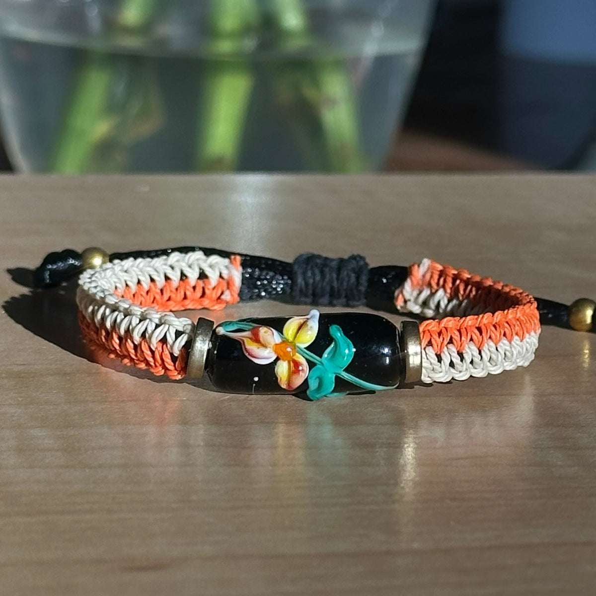 Persimmon Night | Lampwork Glass Flower Bracelet on Orange & Cream Woven Cotton Cord