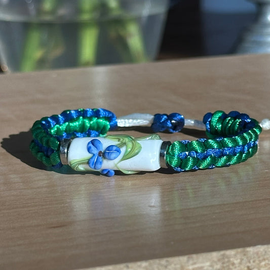 Bluebonnet Glade | Lampwork Glass Flower Bracelet on Emerald Green & Royal Blue Braided Cord