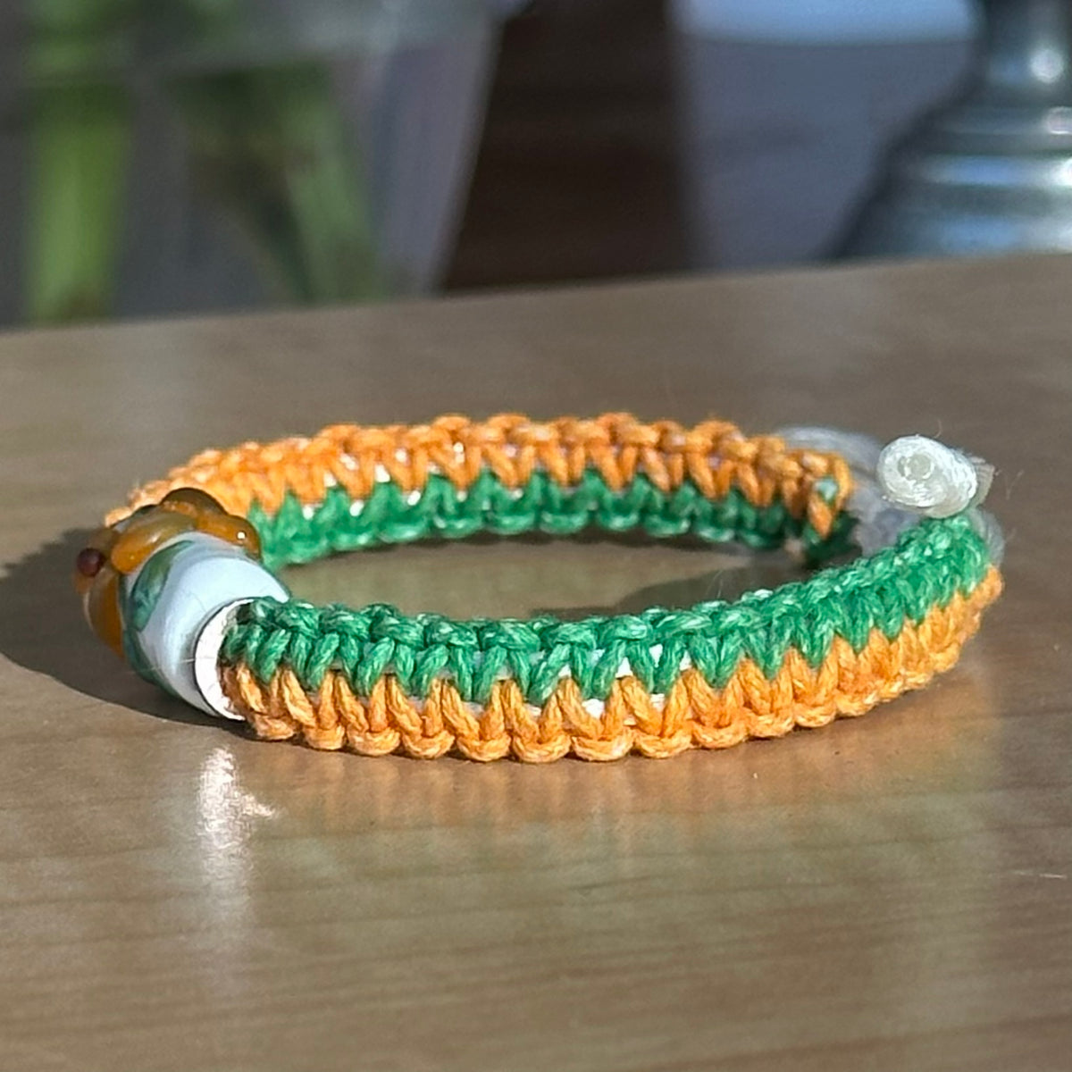 Marigold Meadow | Lampwork Glass Flower Bracelet on Orange & Green Woven Cotton Cord